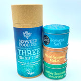 Three Tin Gift Set with three tins next to it